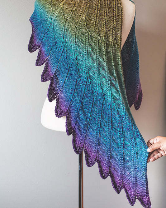 Original Wingspan, Size B. A knitted shawl designed to look like wings.