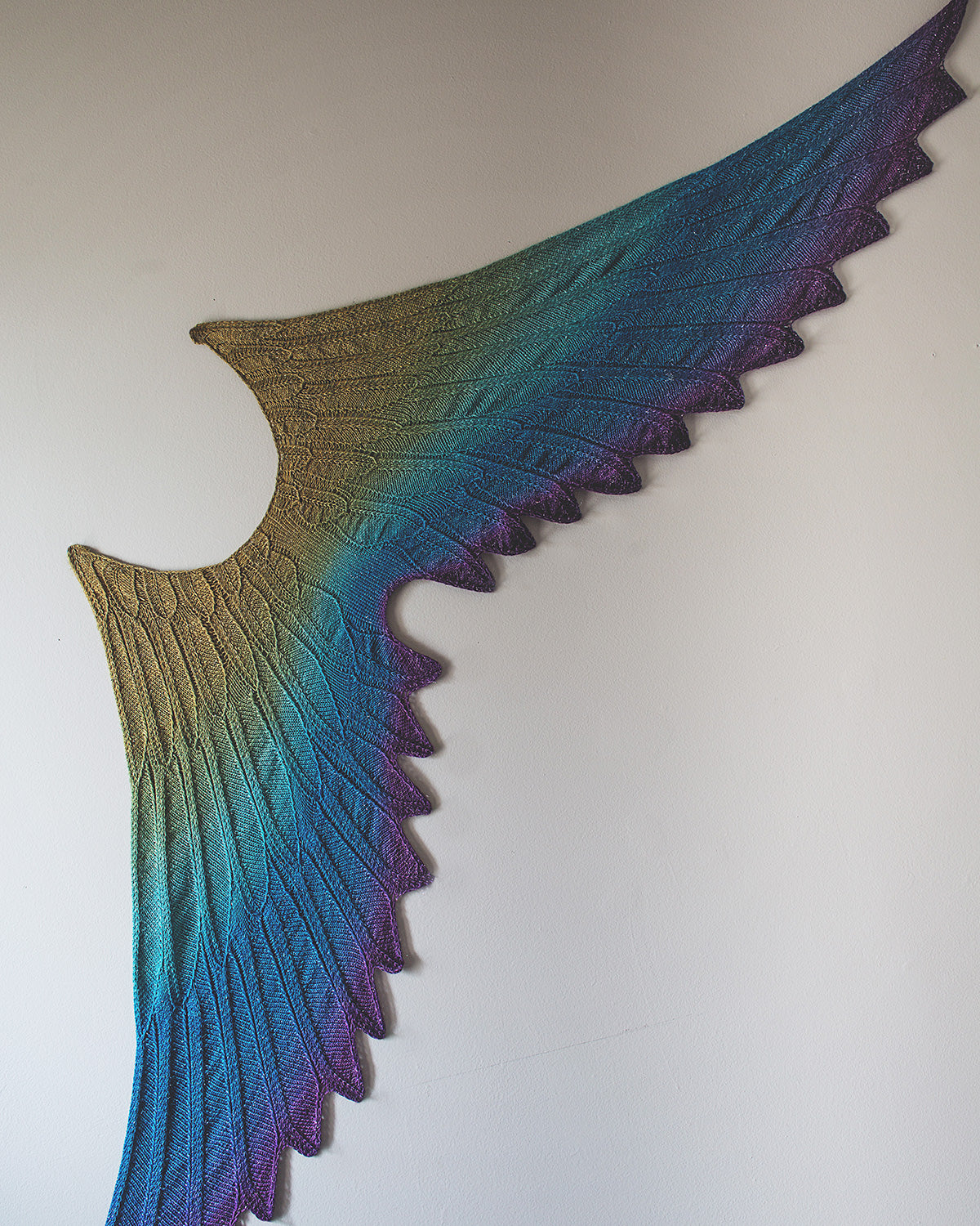 Original Wingspan, Size B. A knitted shawl designed to look like wings.