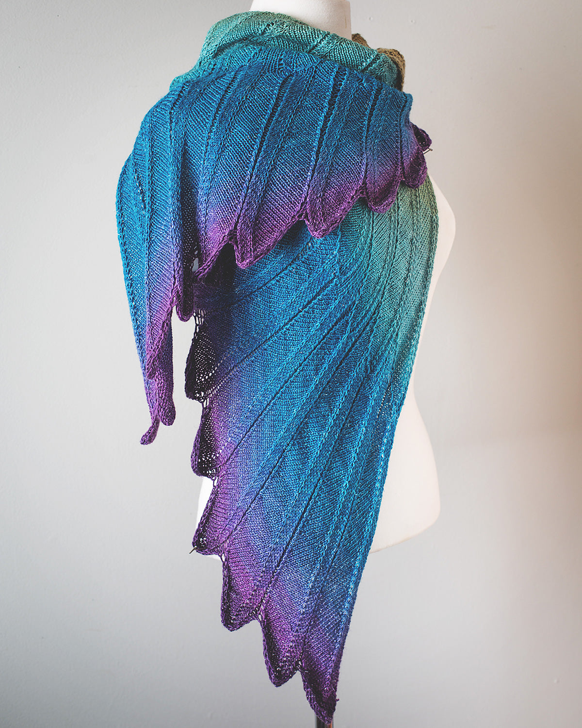 Original Wingspan, Size B. A knitted shawl designed to look like wings.