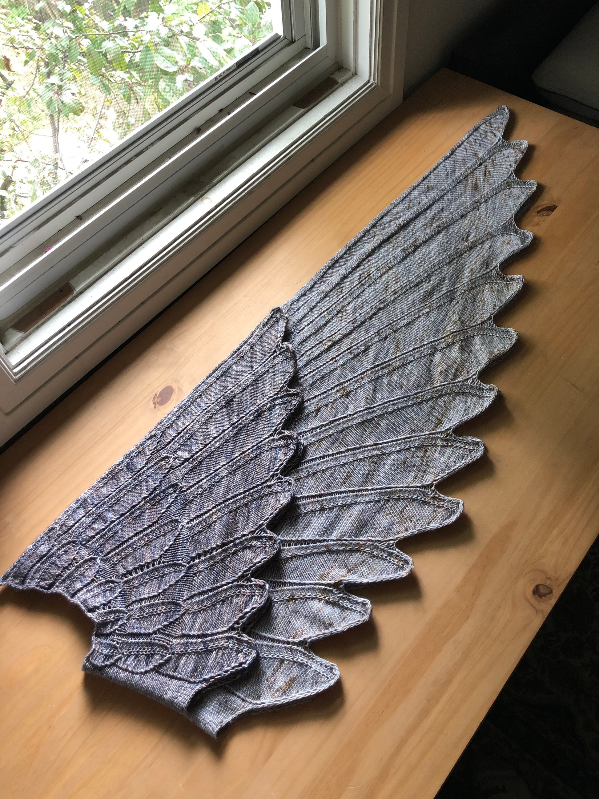 Wingspan, Sizes A and C. A knitted shawl designed to look like wings.